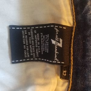 Womans destressed bluejeans